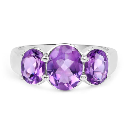 3-stone amethyst ring with central large gemstone and two side stones in .925 sterling silver by Bids.com on Tampa Home & Garden Store