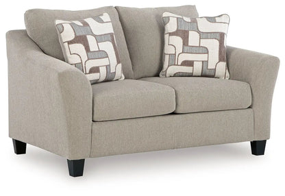 Willarae 2-Pc taupe sofa loveseat by Unique Piece Furniture with patterned throw pillows on Tampa Home & Garden Store