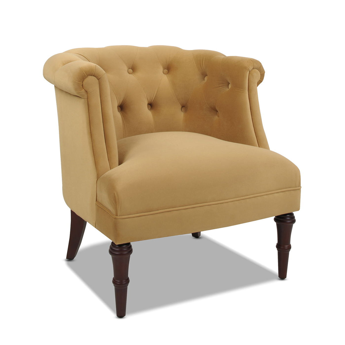 Tufted yellow velvet chair with barrel back and dark wood legs on Tampa Home & Garden Store