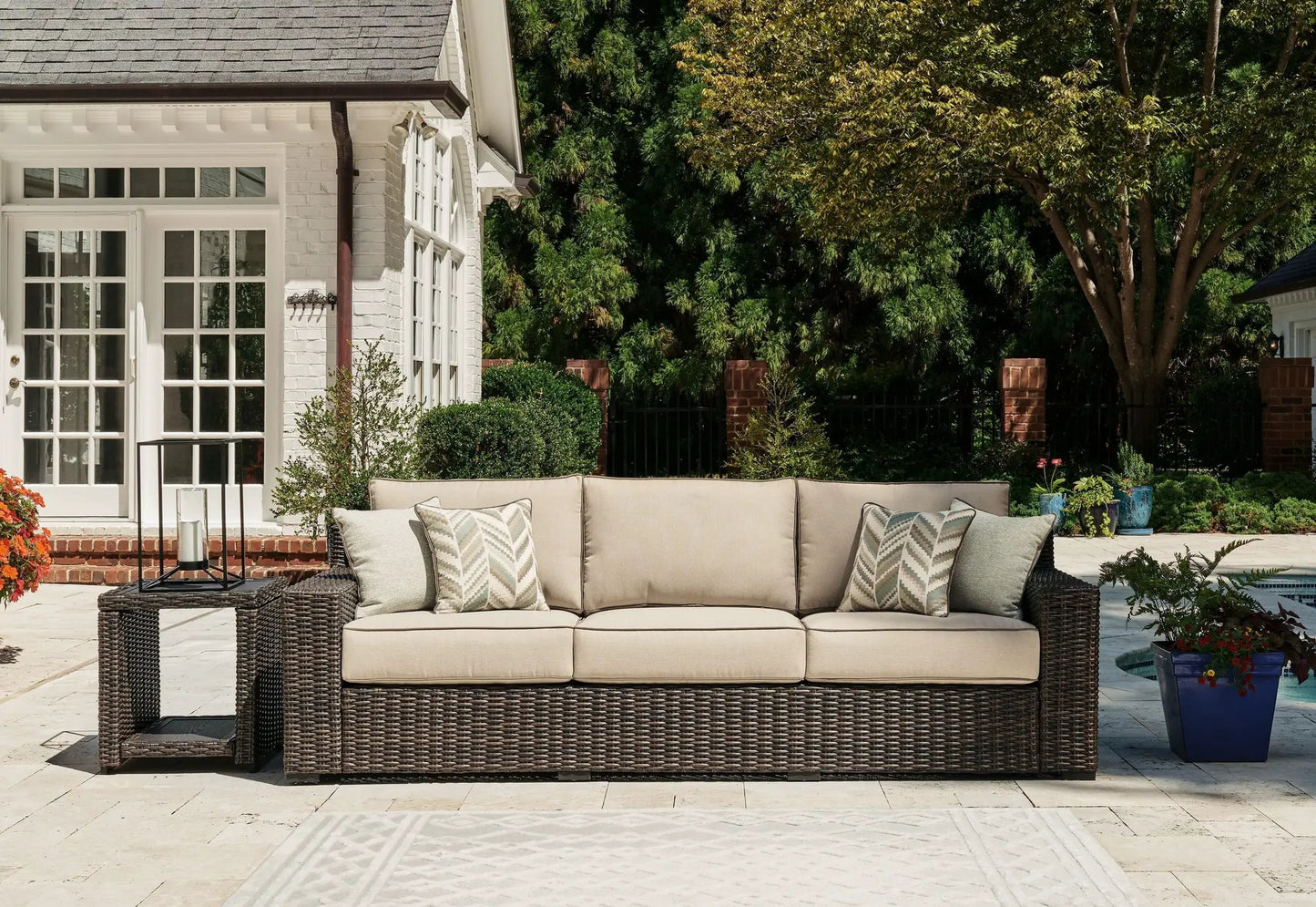 Coastline Bay brown wicker sofa with cushions by Unique Piece Furniture on Tampa Home & Garden Store