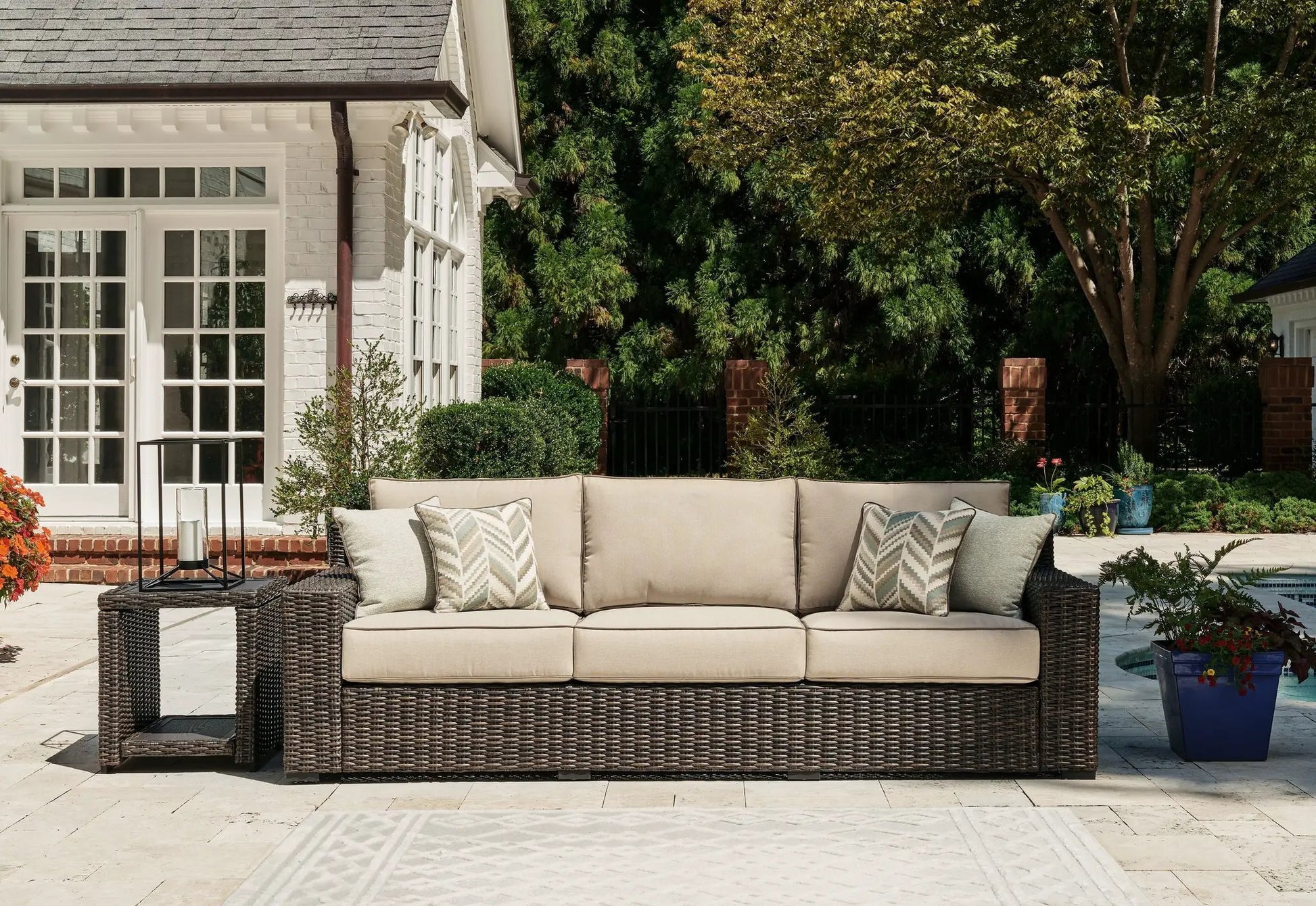 Coastline Bay brown wicker sofa with cushions by Unique Piece Furniture on Tampa Home & Garden Store