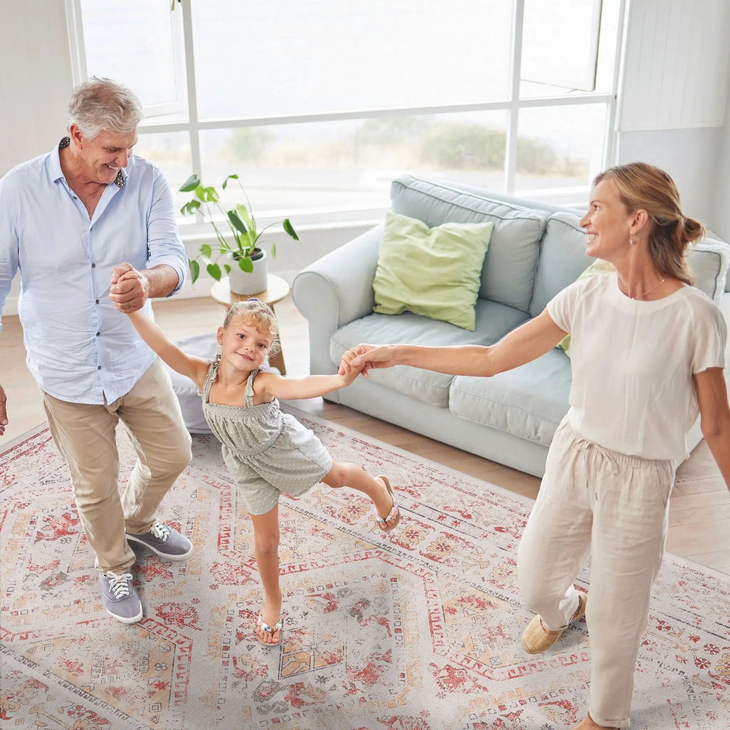 Maval washable rug in soft pink beige with a faded geometric pattern, living room area rug on Tampa Home & Garden Store