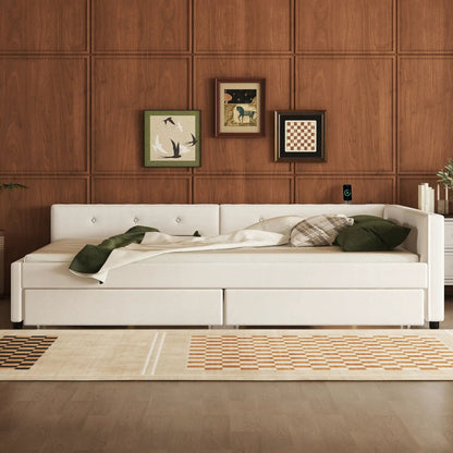 White upholstered platform bed with USB ports and drawers against a wood wall on Tampa Home & Garden Store