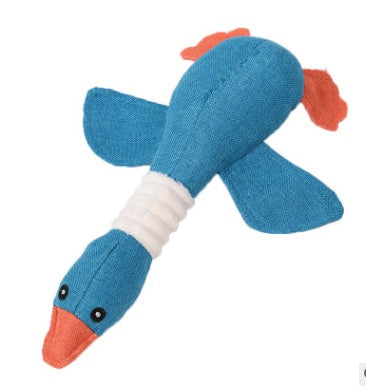 Dayan plush dog toy from Sell My Stuff, blue body with orange beak and tail on Tampa Home & Garden Store