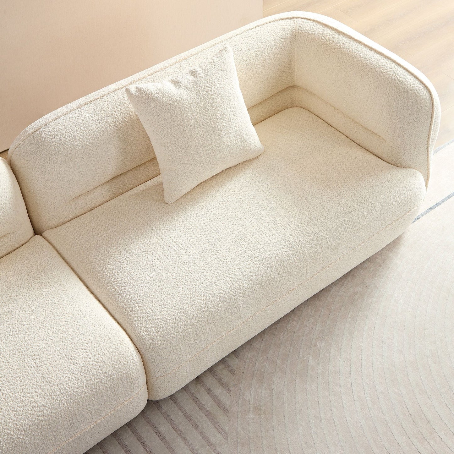 Stationary sofa in cream boucle fabric with matching cushion and solid wood frame HouseOfZazla on Tampa Home & Garden Store