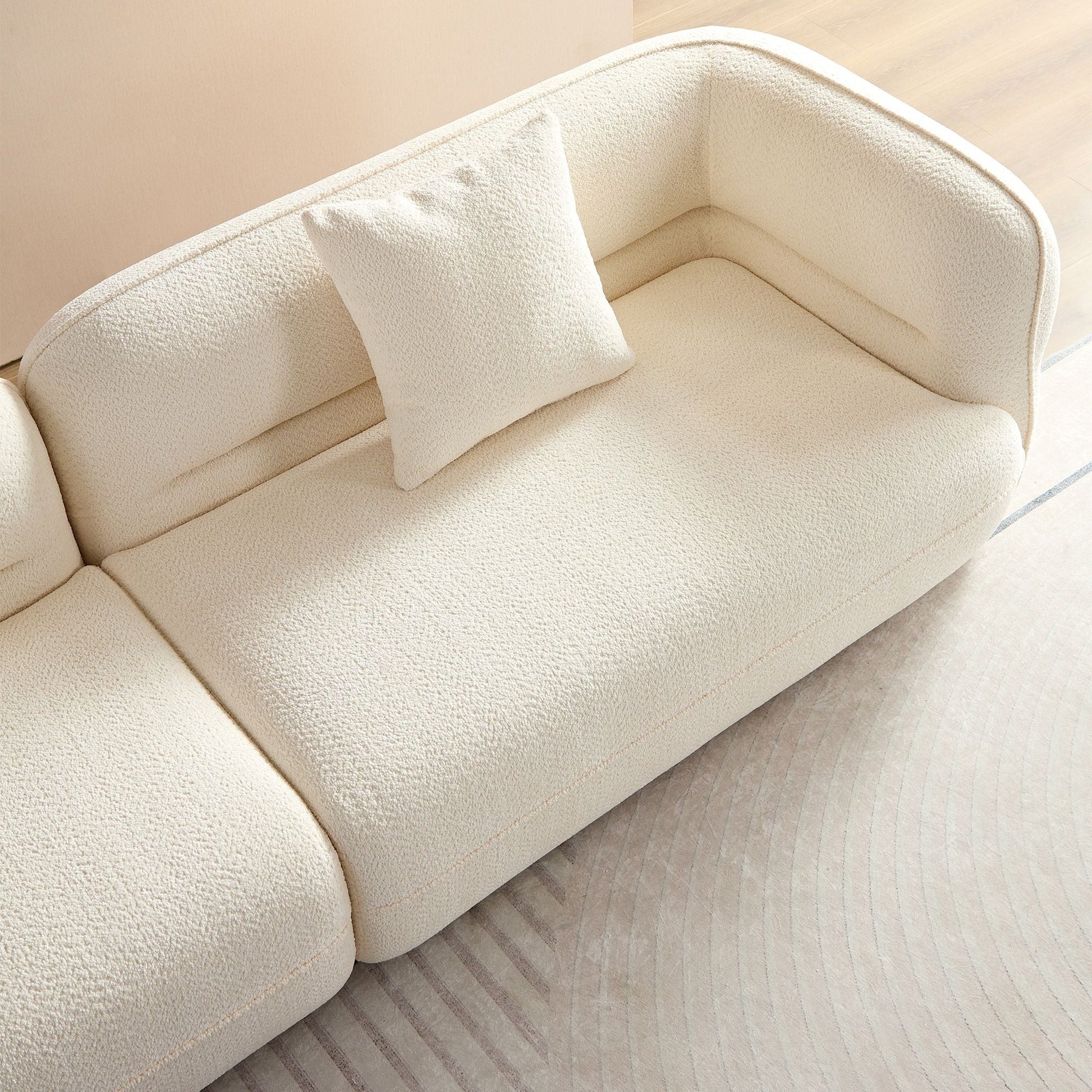 Stationary sofa in cream boucle fabric with matching cushion and solid wood frame HouseOfZazla on Tampa Home & Garden Store