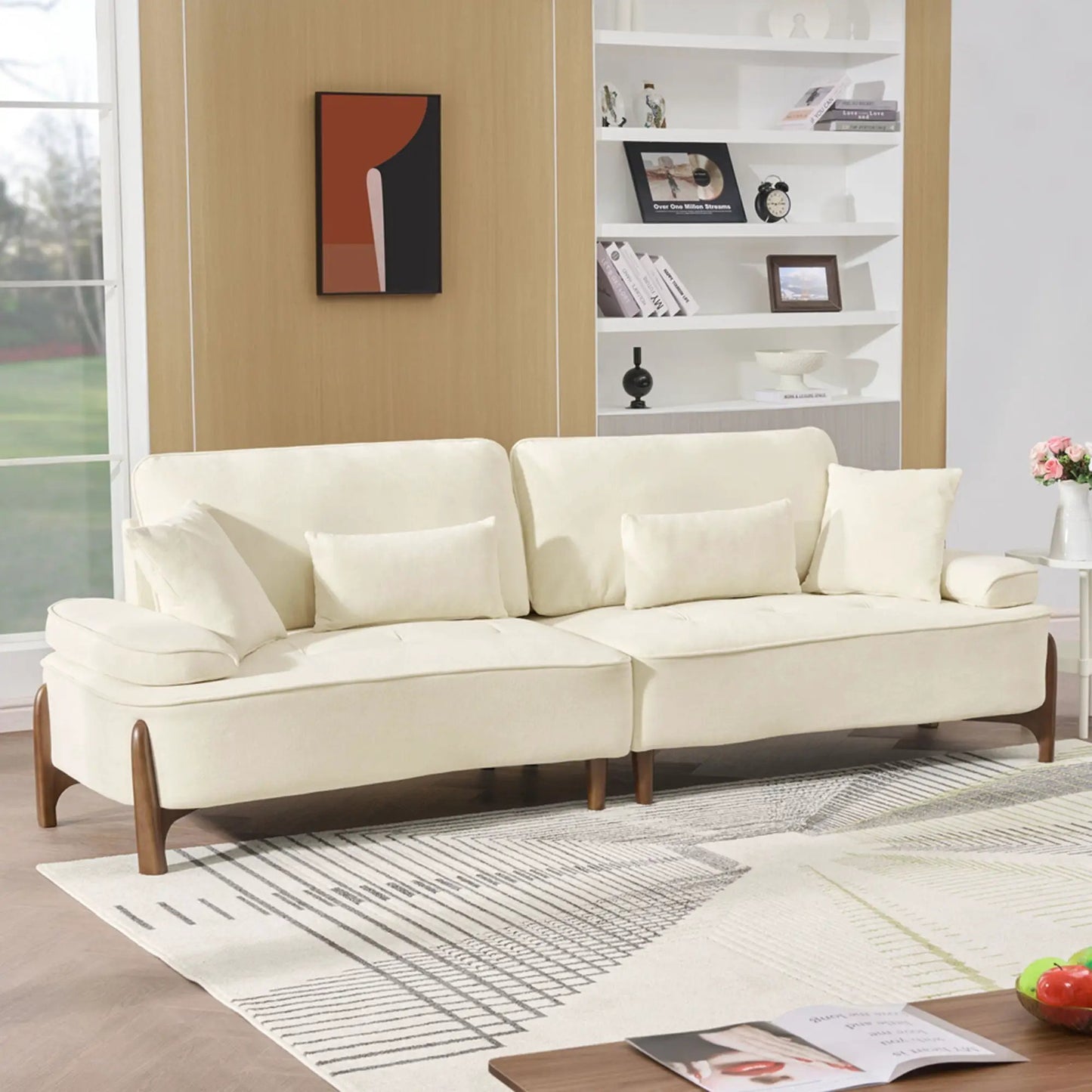 Comfortable Deep Seated Sofa with Pillows in cream fabric and wooden legs in a living room on Tampa Home & Garden Store