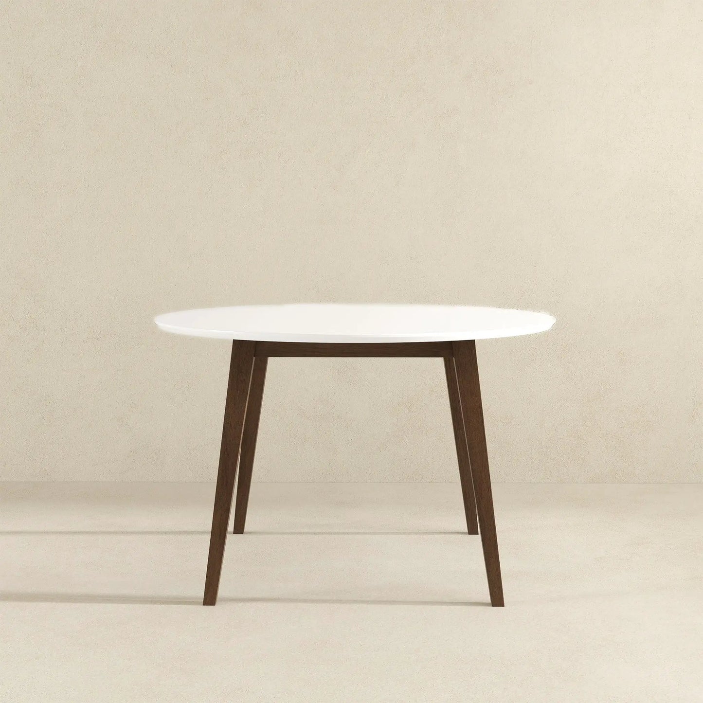 Paloma dining table with white round top and dark wood angled legs Unique Piece Furniture on Tampa Home & Garden Store