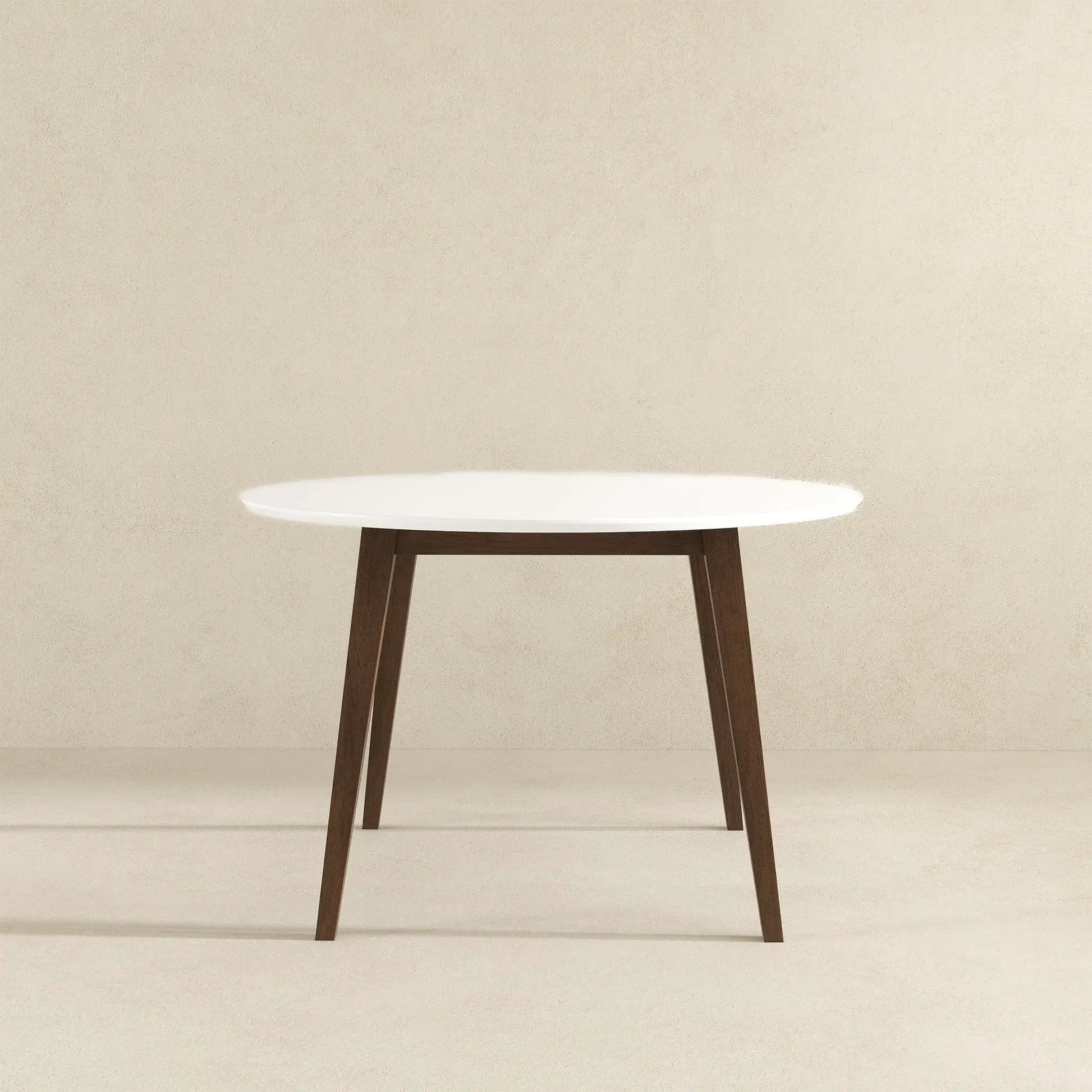 Paloma dining table with white round top and dark wood angled legs Unique Piece Furniture on Tampa Home & Garden Store