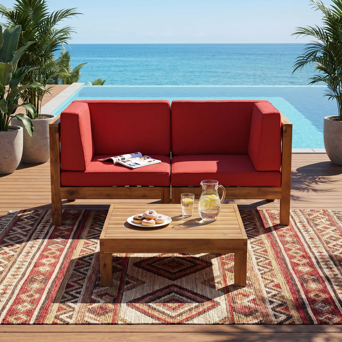 Brava X-Back 2-Seater sectional loveseat with coffee table, red cushions, wooden frame poolside on Tampa Home & Garden Store