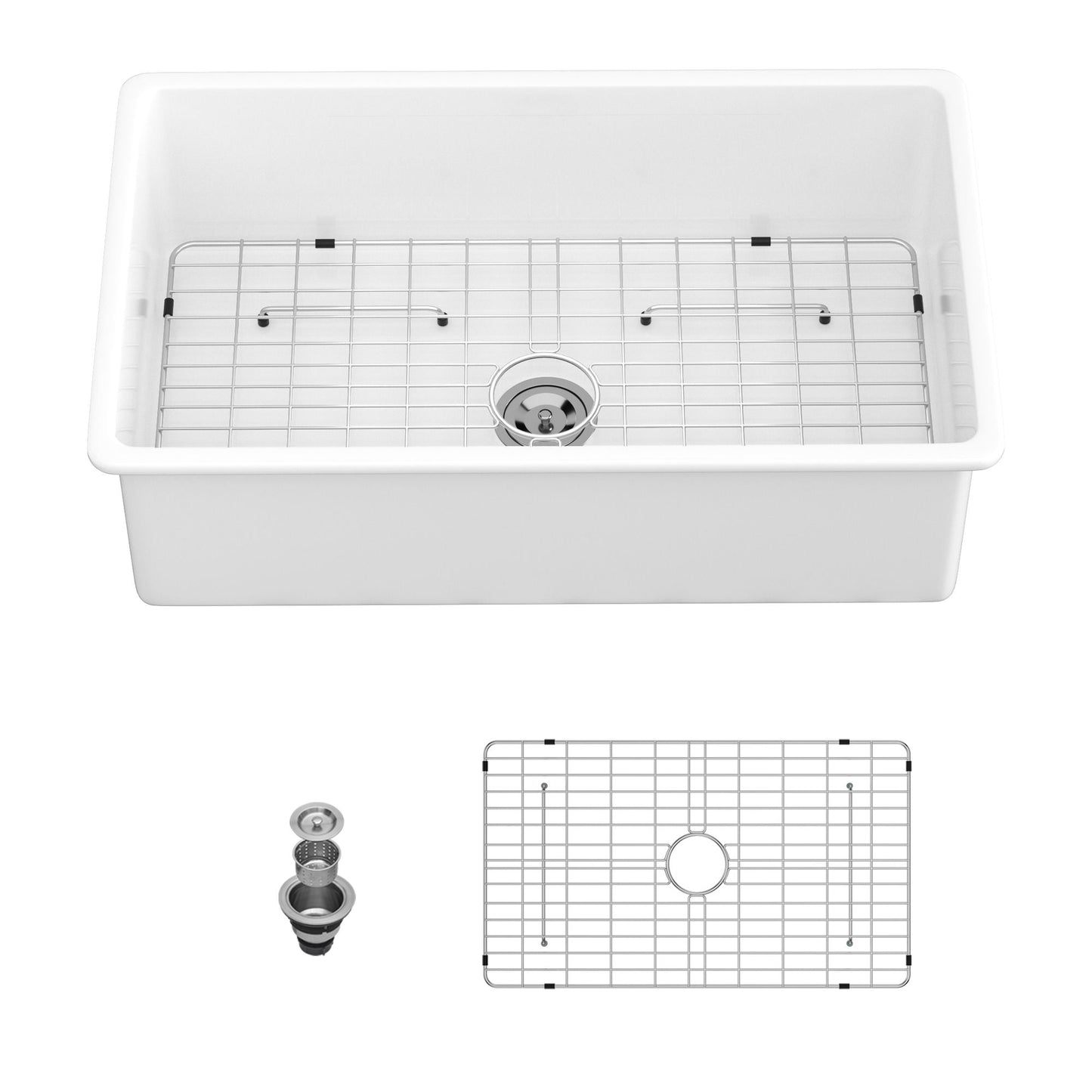 White ceramic farmhouse apron-front undermount sink with stainless grid rack on Tampa Home & Garden Store