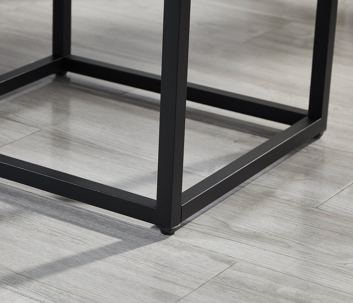 Astral 3-Piece Bedroom Set metal bed frame base in black with square legs on a light floor on Tampa Home & Garden Store