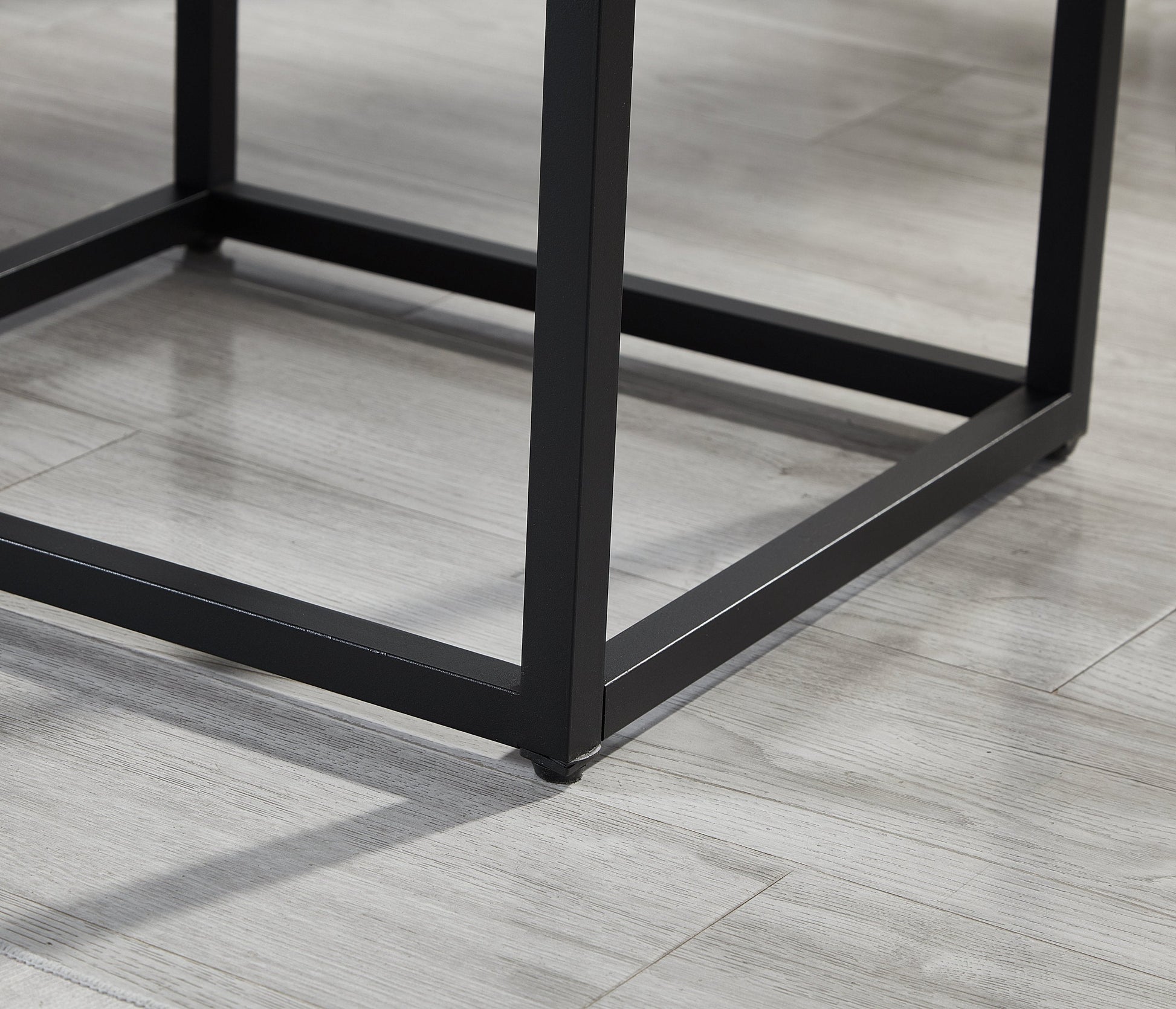Astral 3-Piece Bedroom Set metal bed frame base in black with square legs on a light floor on Tampa Home & Garden Store