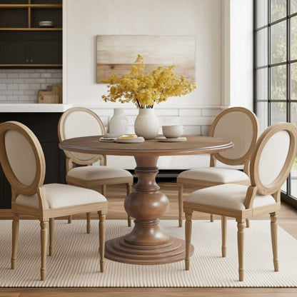 Walnut round pedestal dining table with diamond veneer top, warm wood finish on Tampa Home & Garden Store