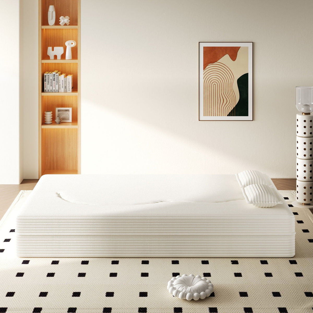 Floor Sofa with 2 white pillows, white convertible twin-size mattress in a modern bedroom setting on Tampa Home & Garden Store