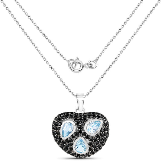 Sterling silver skull pendant encrusted with black spinel pave and blue topaz teardrops on Tampa Home & Garden Store