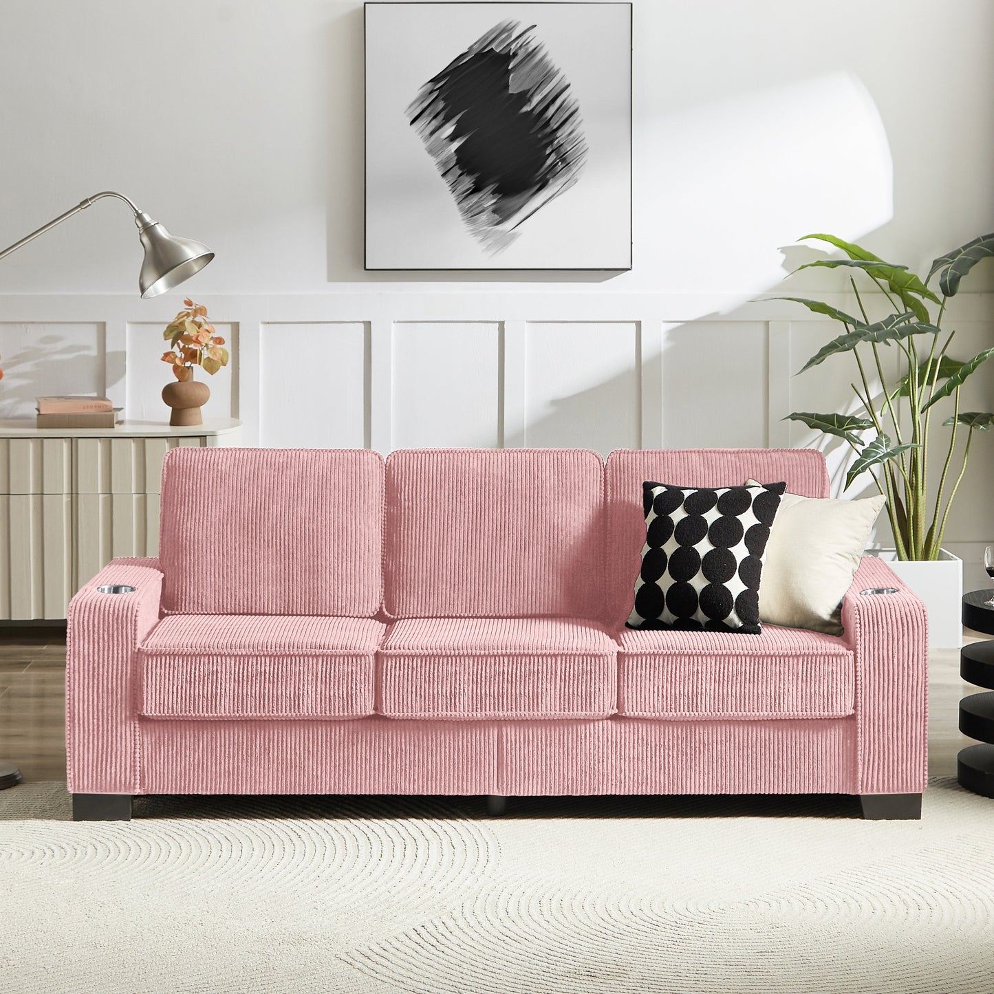 Modern corduroy 3-seater sofa in soft pink with ribbed upholstery in a cozy living room on Tampa Home & Garden Store