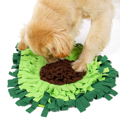 Dog snuffle mat puzzle toy with green fleece strips around a brown center, dog sniffing on Tampa Home & Garden Store