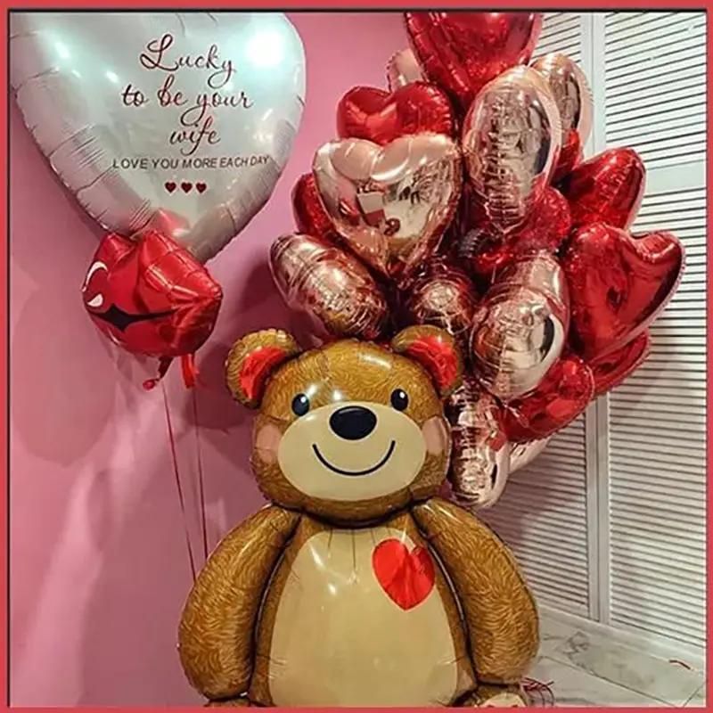 Bear-shaped foil balloon with a heart, surrounded by a cluster of red pink heart balloons on Tampa Home & Garden Store