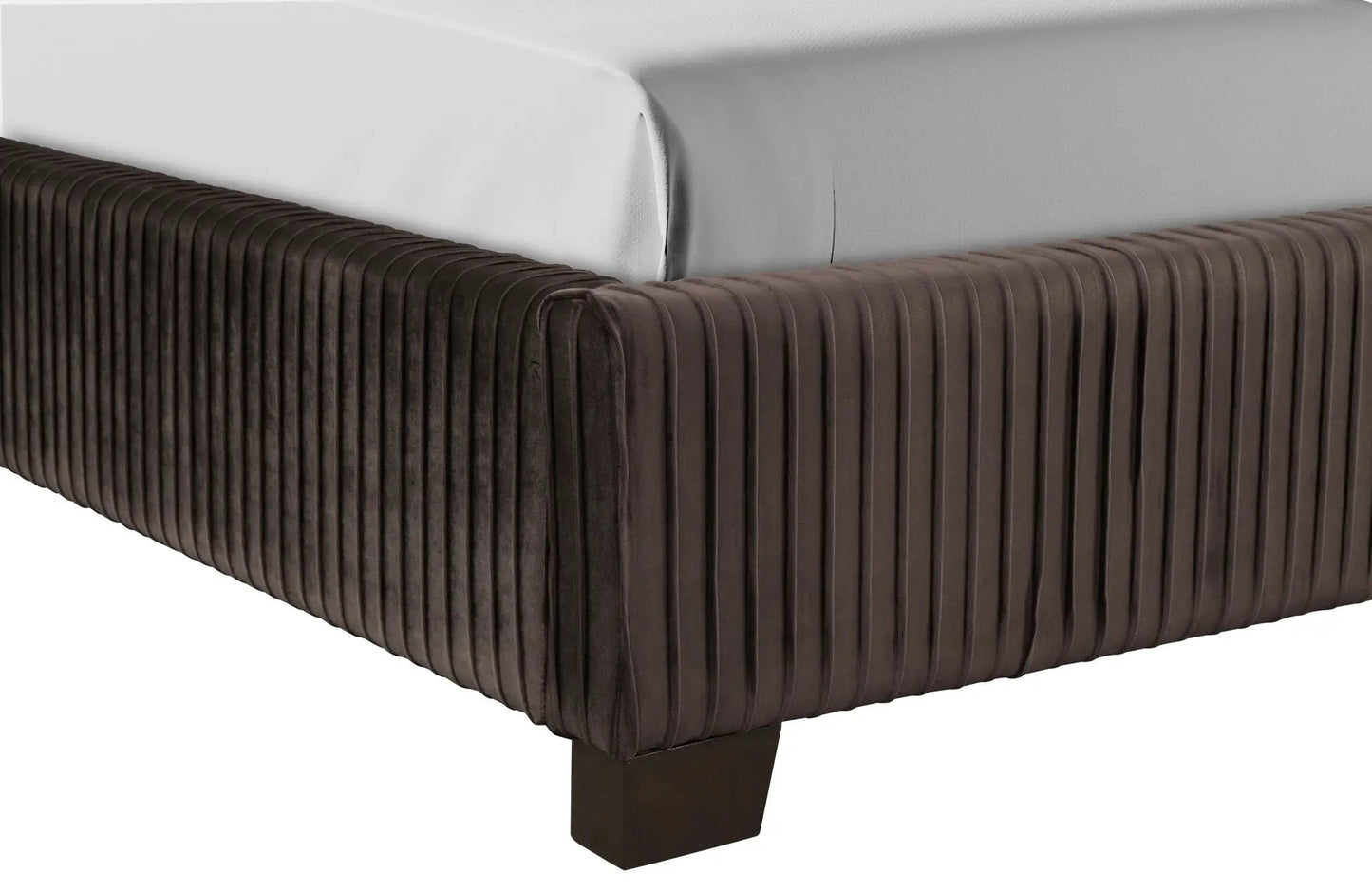 Upholstered bed by Unique Piece Furniture with brown pleated sides and white mattress on Tampa Home & Garden Store