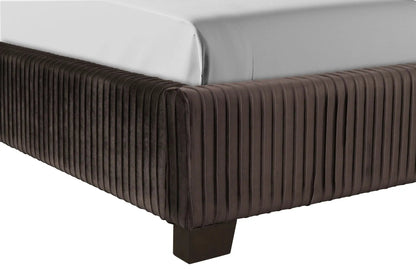 Upholstered bed by Unique Piece Furniture with brown pleated sides and white mattress on Tampa Home & Garden Store