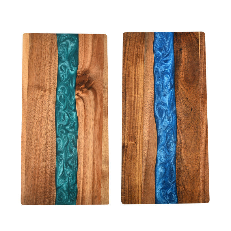 Set of 2 acacia wood cutting boards with teal and blue epoxy resin ocean wave inlays on Tampa Home & Garden Store