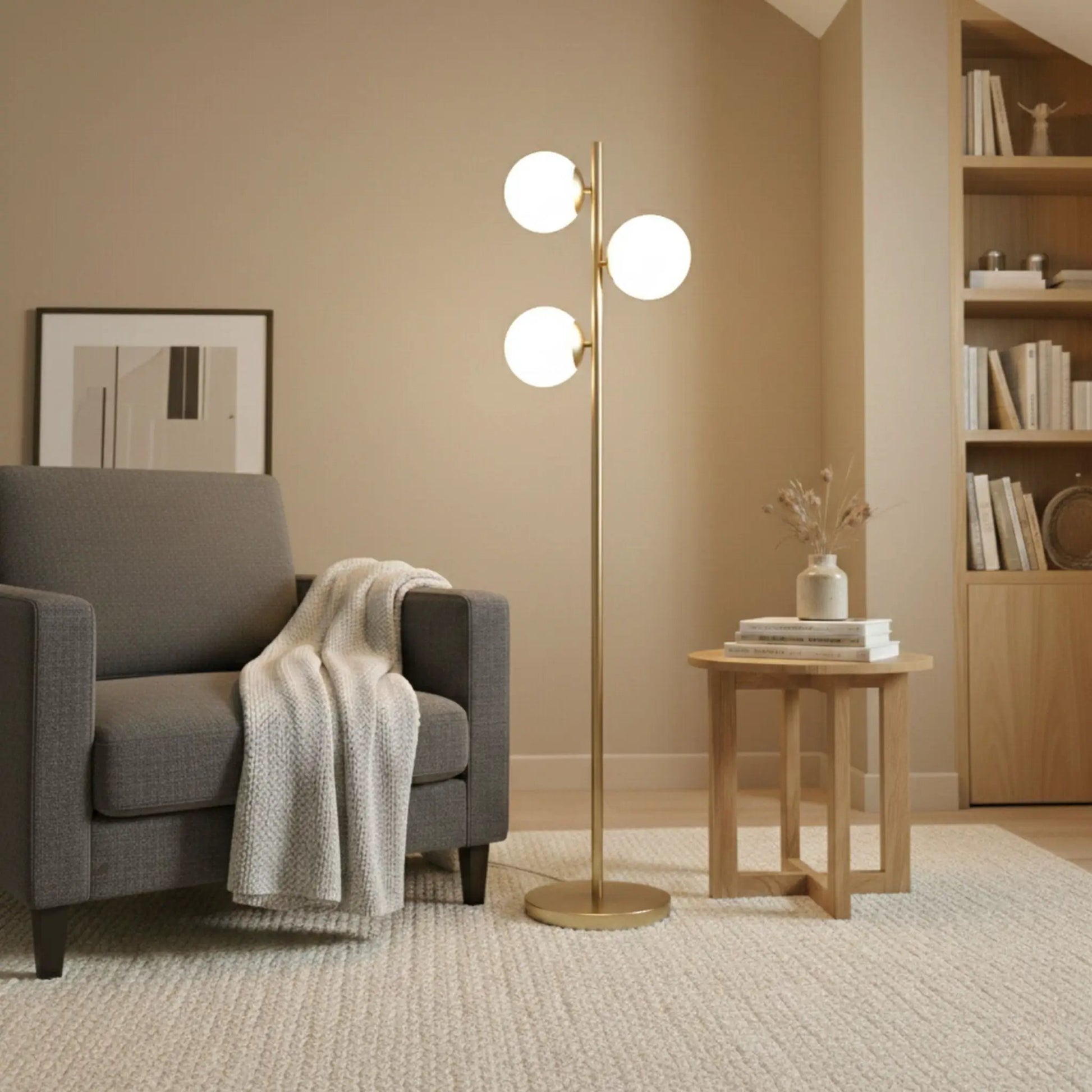 Brilliance modern floor lamp with three opal globe shades on a gold stem and round base on Tampa Home & Garden Store