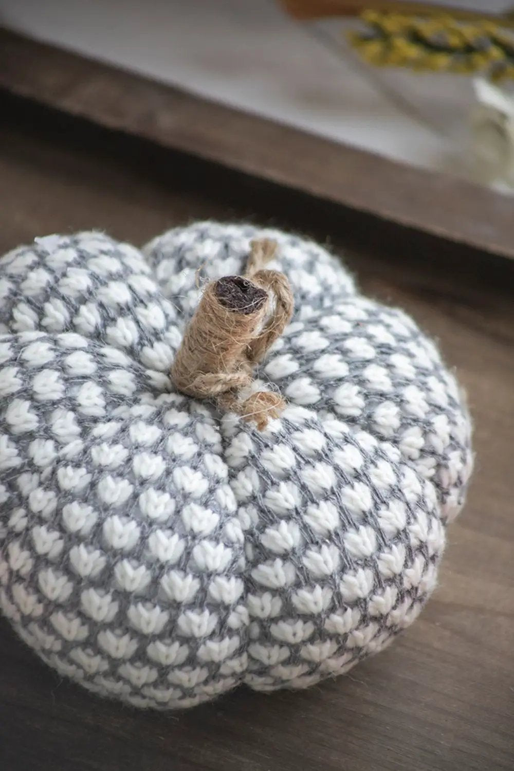 Knite pumpkin ornament sculpture in grey and white knitted fabric with a rustic jute stem on Tampa Home & Garden Store