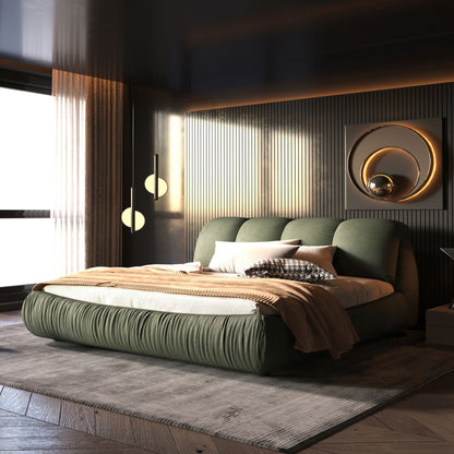 Upholstered platform bed with oversized padded backrest in green velvet and wood frame on Tampa Home & Garden Store
