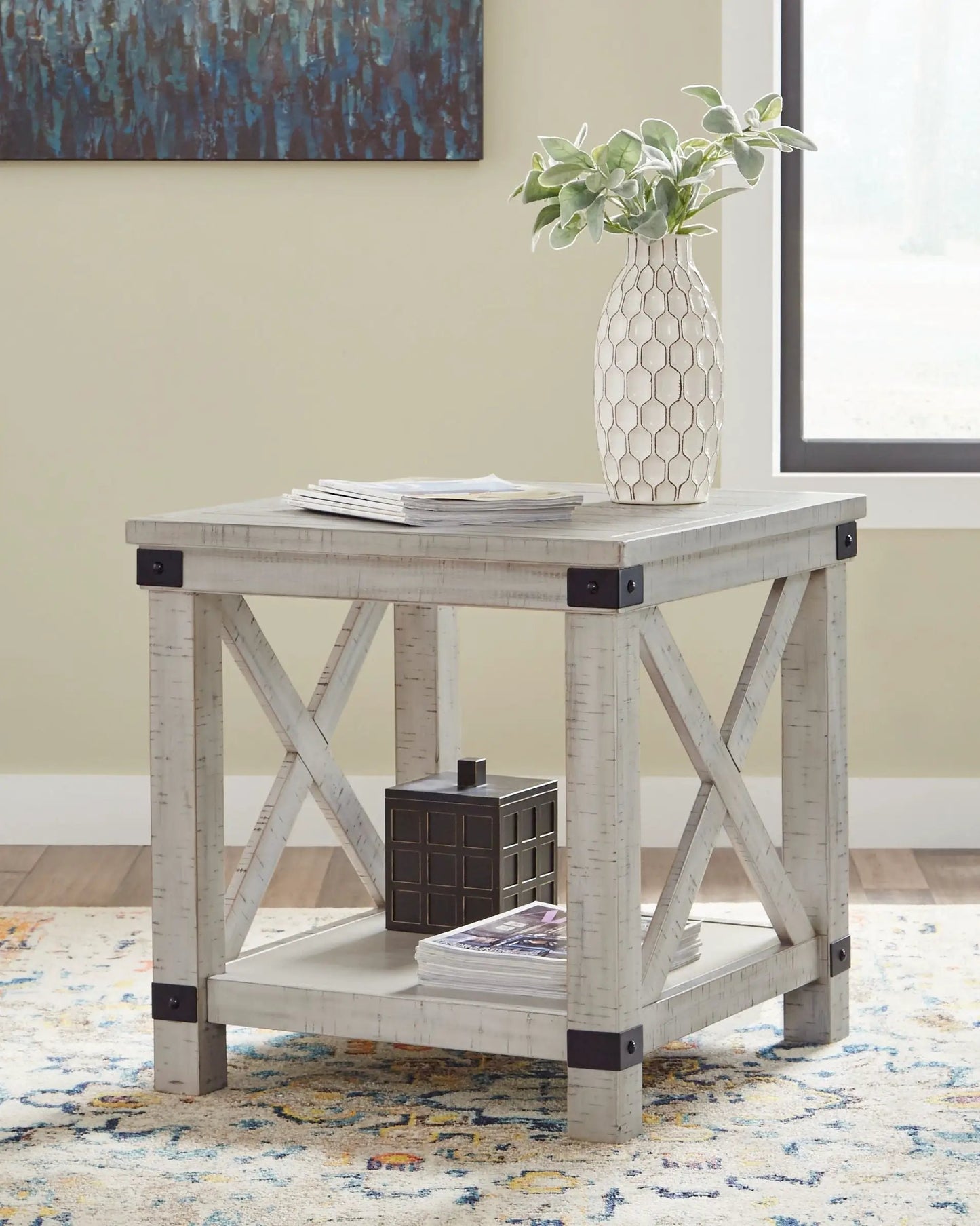 Carynhurst rectangular end table whitewash by Unique Piece Furniture with black metal corner brackets on Tampa Home & Garden Store