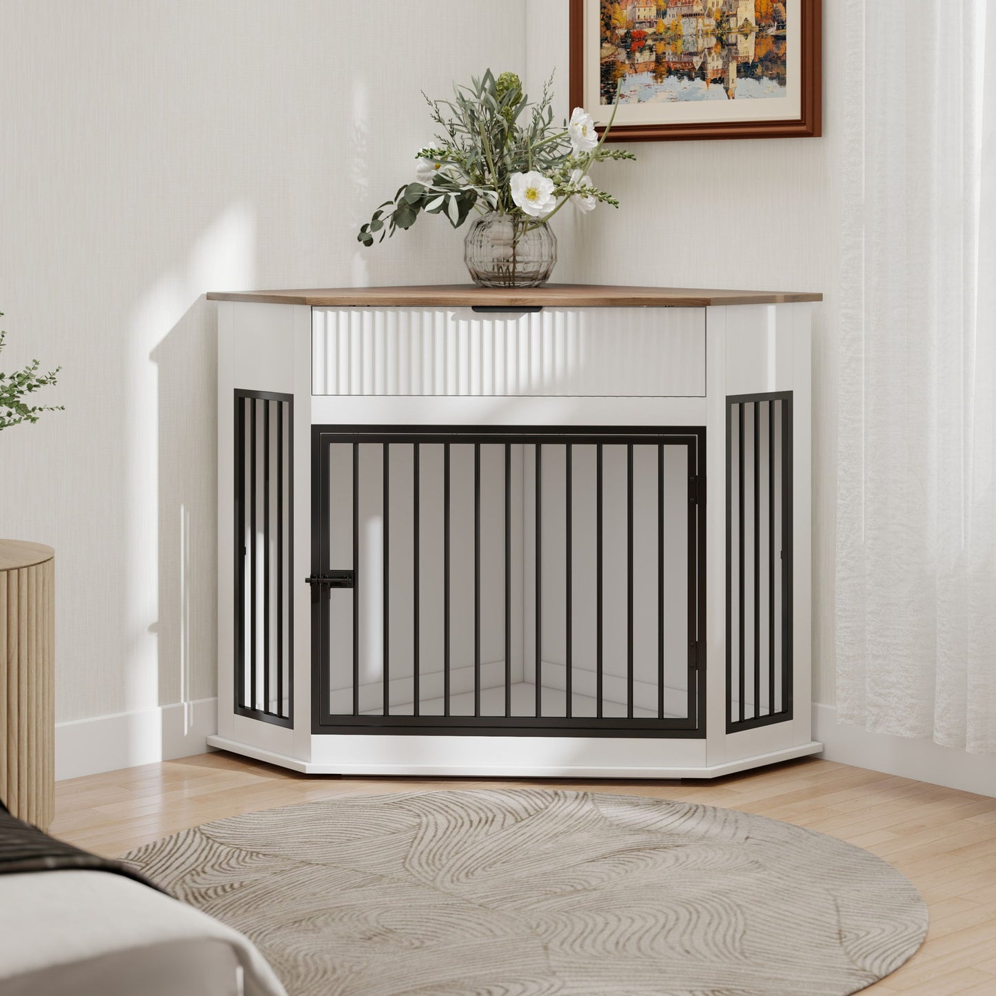 Corner dog crate in white with black bars and natural wood top, vase of white flowers on Tampa Home & Garden Store