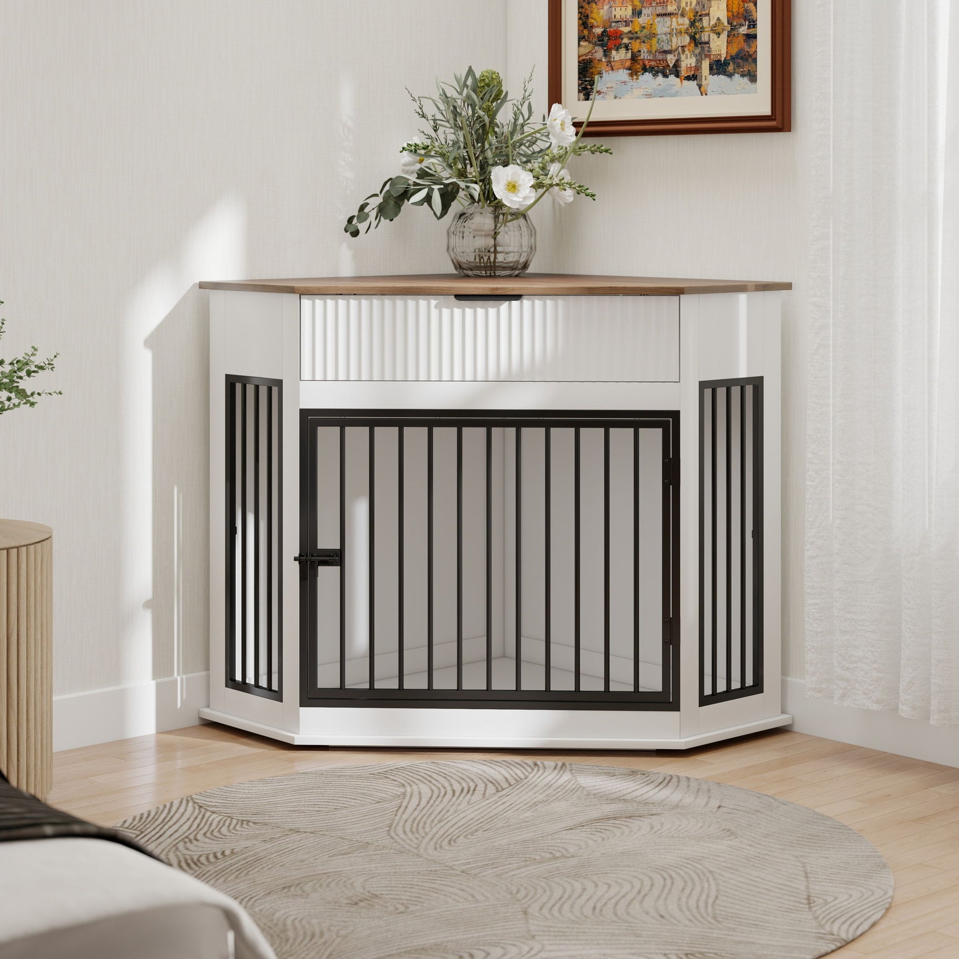 Corner dog crate in white with black bars and natural wood top, vase of white flowers on Tampa Home & Garden Store