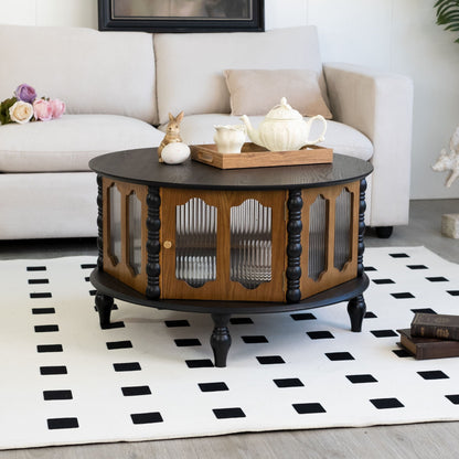 Round storage coffee table with fluted glass doors, black top and dark brown wood base on Tampa Home & Garden Store