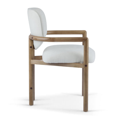 Upholstered arm dining chair with light gray fabric cushions and natural wood frame on Tampa Home & Garden Store