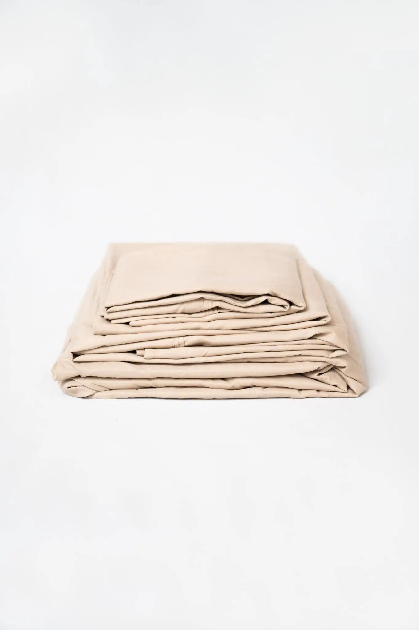 4 Piece Micro and Bamboo Flex Head Hypoallergenic Sheet Set beige folded stack on Tampa Home & Garden Store