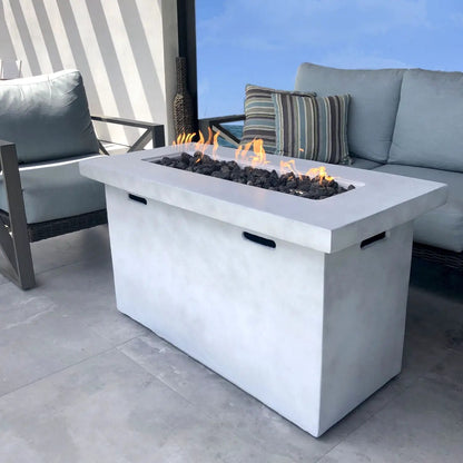 Reinforced propane outdoor fire pit table in light gray concrete with lava rocks on Tampa Home & Garden Store