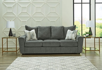Stairatt Sofa gray stationary sofa by Unique Piece Furniture with two decorative pillows on Tampa Home & Garden Store