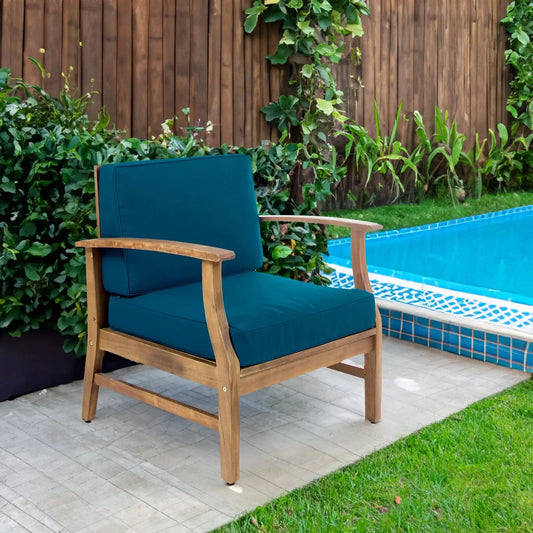 Perla Club Chair blue cushions with acacia wood frame outdoor chair by poolside on Tampa Home and Garden Store