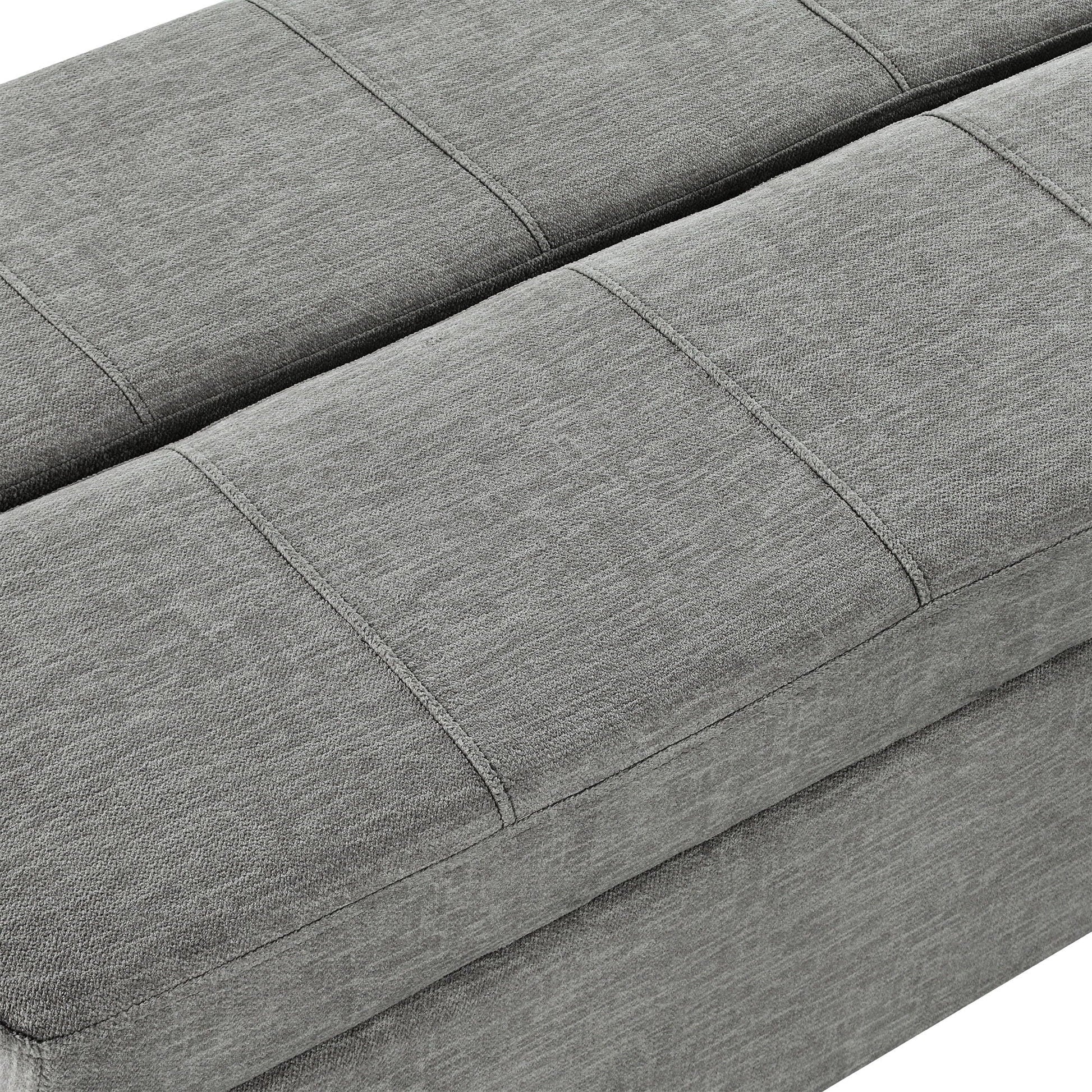 Twin size folding ottoman sleeper bed in gray textured fabric with stitched panels on Tampa Home & Garden Store