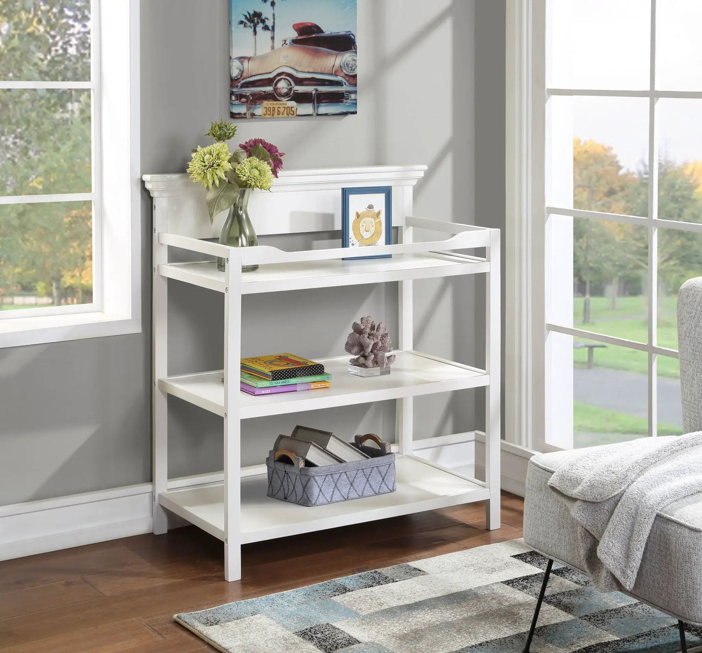 Universal Changing Table white metal frame with shelves and baskets by Unique Piece Furniture on Tampa Home & Garden Store