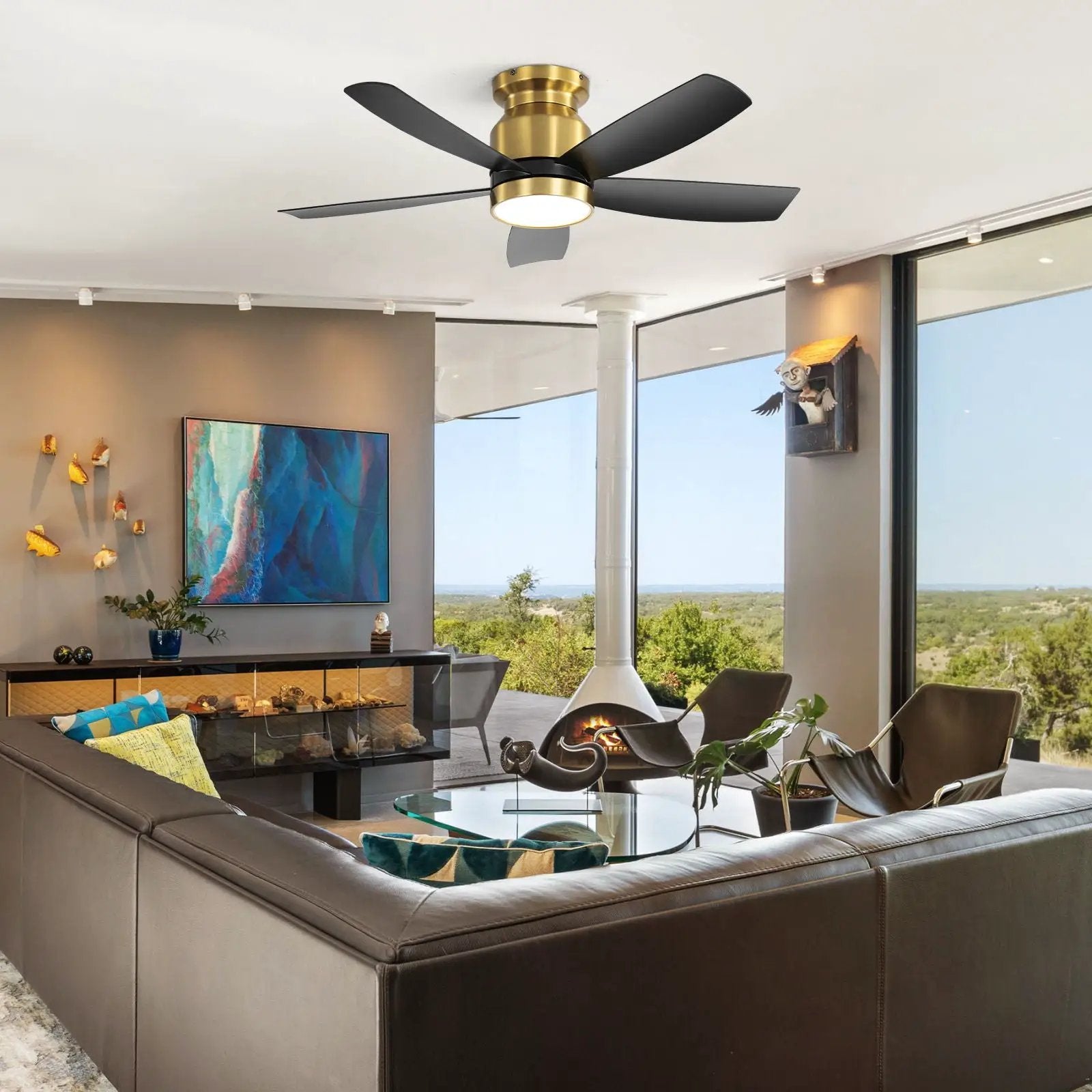 Flush mount ceiling fan with LED light 22W, remote, brass body, black blades in living room on Tampa Home & Garden Store
