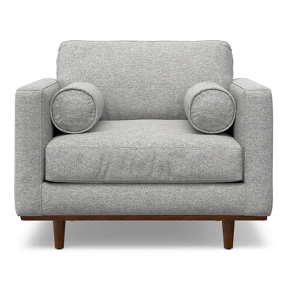 Wide Arm Chair with Removable Cushions in gray fabric, cylindrical arm pillows, wooden legs on Tampa Home & Garden Store