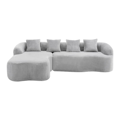 Modular L-shaped sectional sofa with curved chaise in light gray plush fabric, 5 cushions on Tampa Home & Garden Store