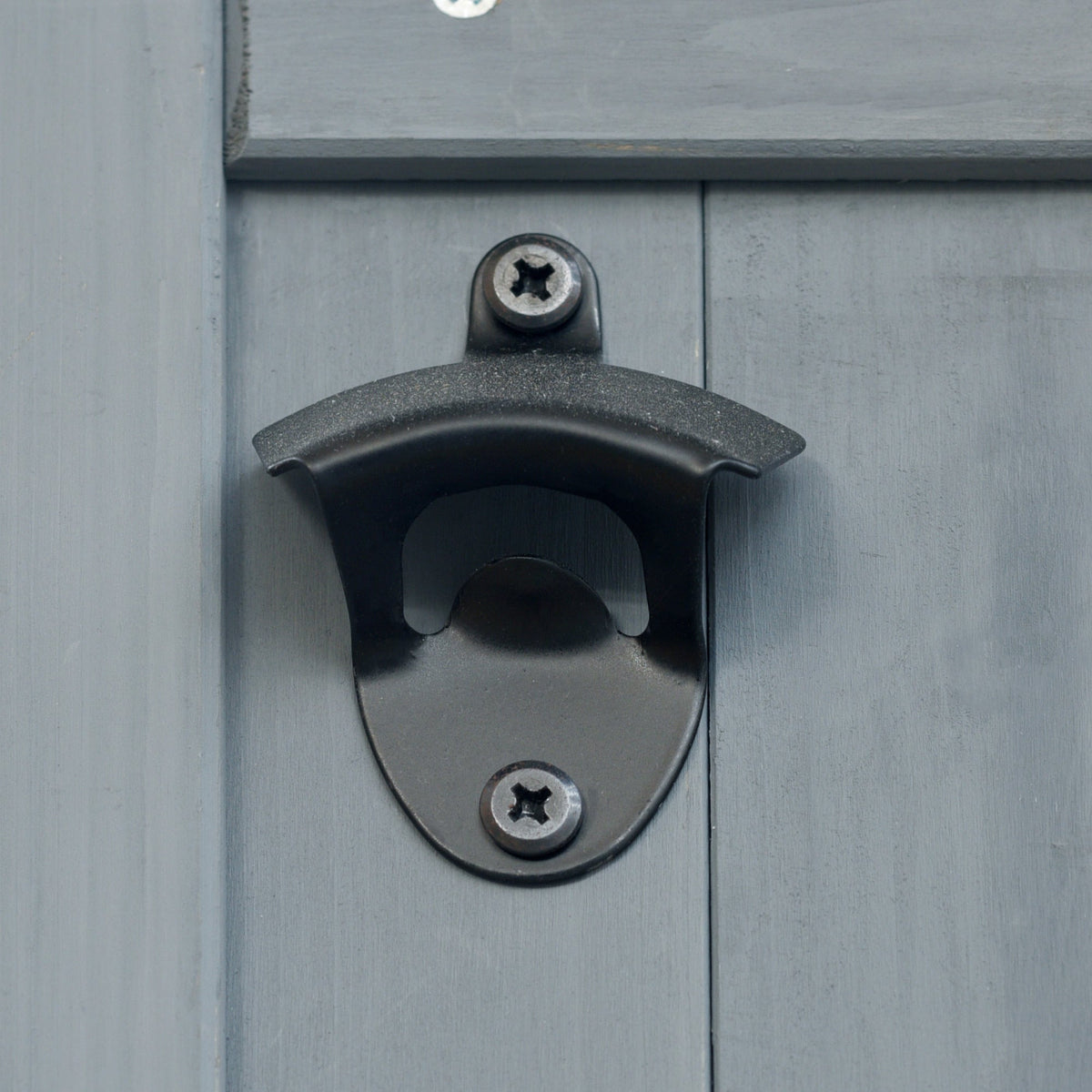 K&K Outdoor Kitchen Island hardware close-up on gray wood panel with black handle on Tampa Home & Garden Store