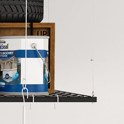 Overhead garage storage rack with crank system in black by HouseOfZazla mounted on wall on Tampa Home & Garden Store