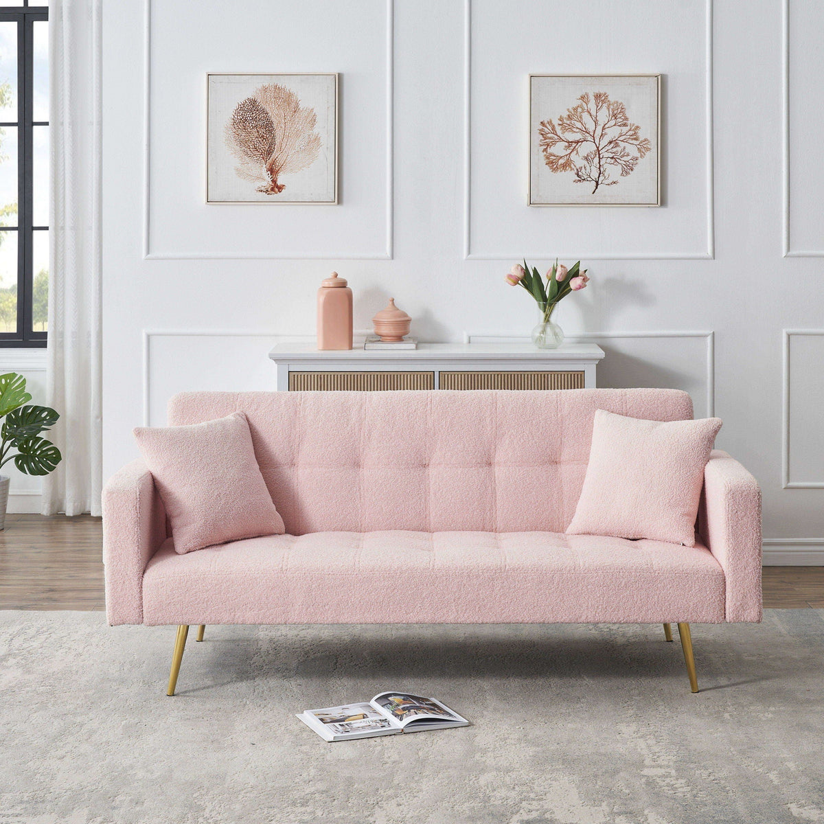 Teddy fleece futon sofa bed in pink with plush pillows and gold legs on Tampa Home & Garden Store