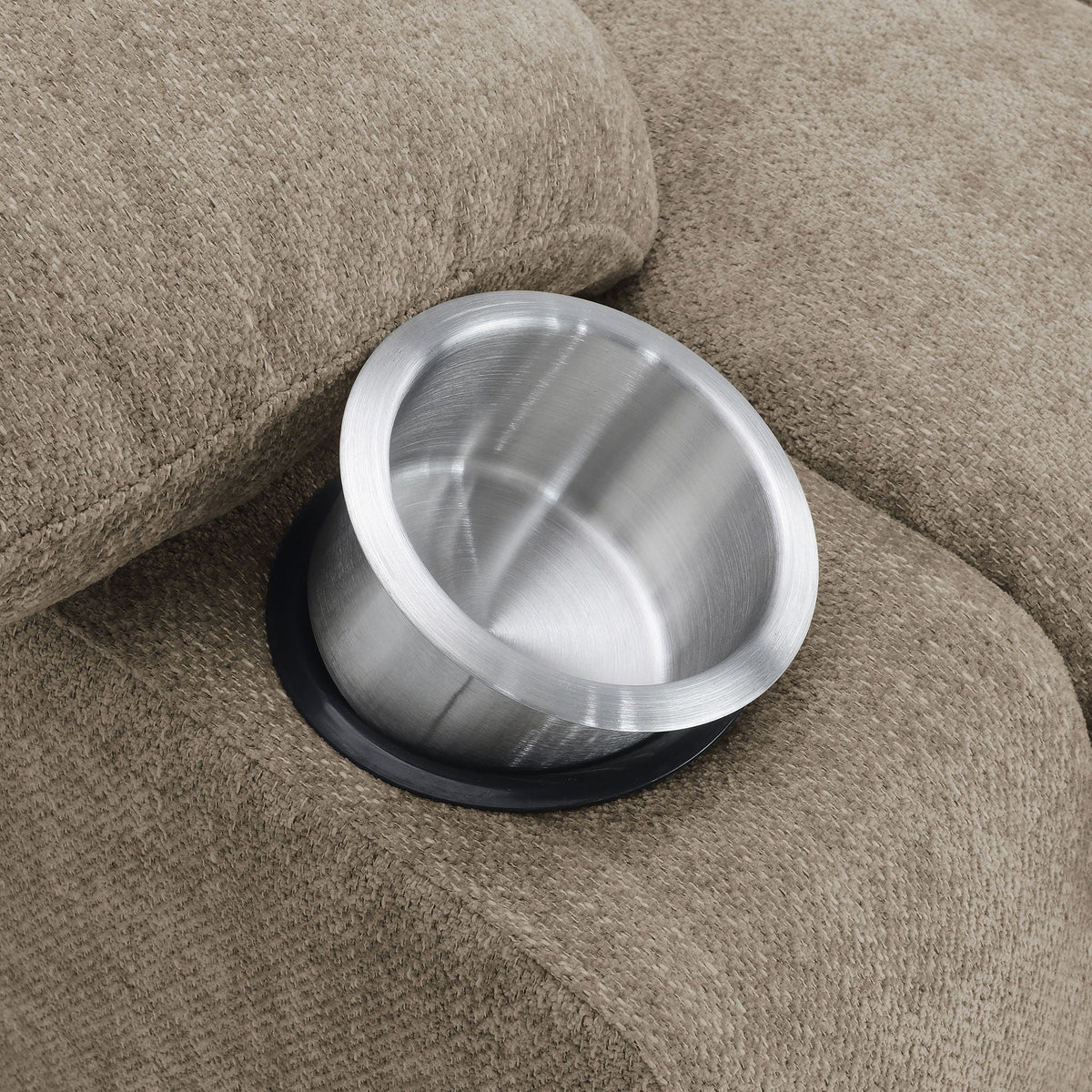 Upholstered lift chair base with circular brushed metal footplate on beige carpet on Tampa Home & Garden Store