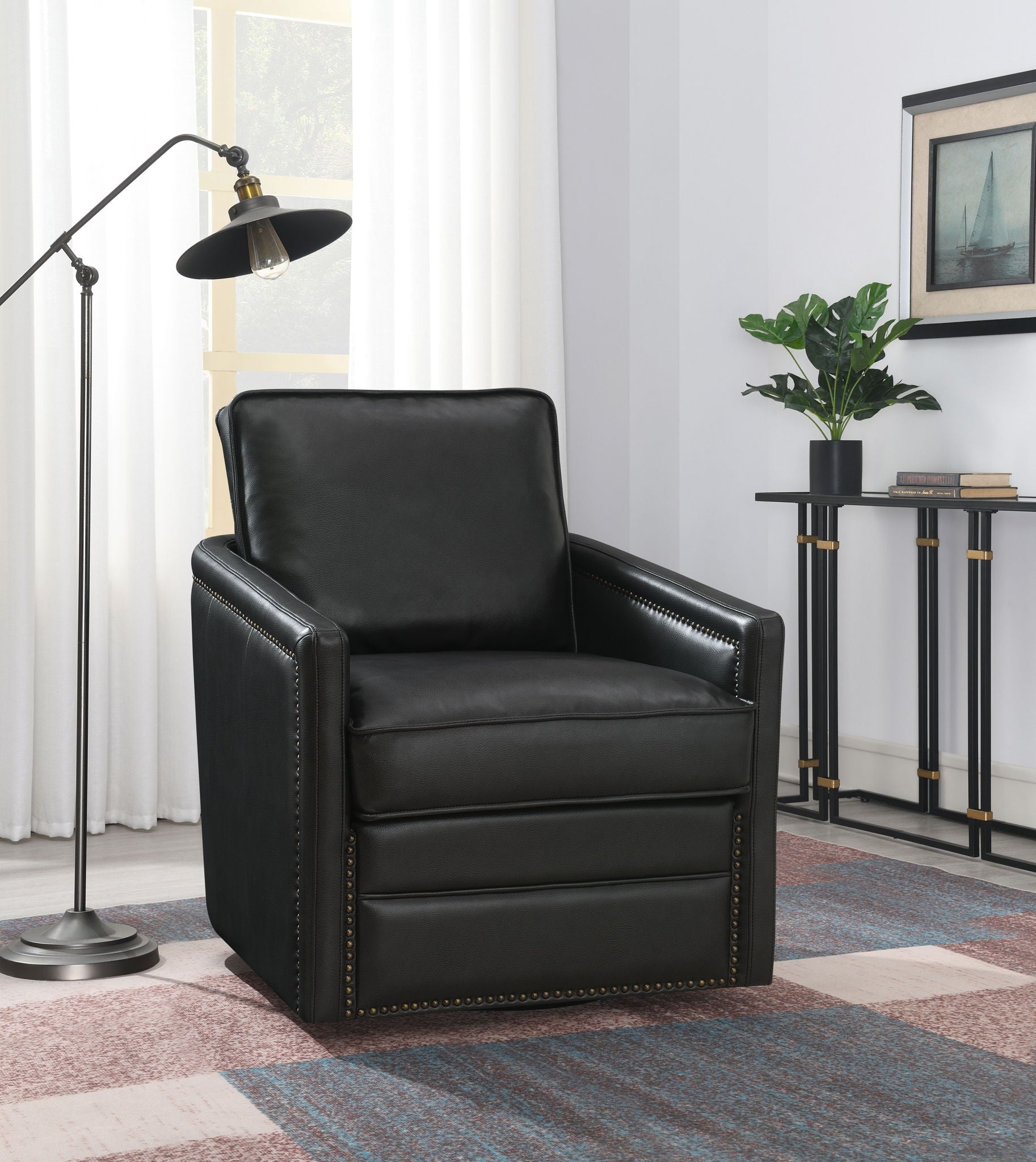 Rocha Aire Swivel Chair With Glider by HouseOfZazla, black faux leather with brass nailhead trim on Tampa Home & Garden Store
