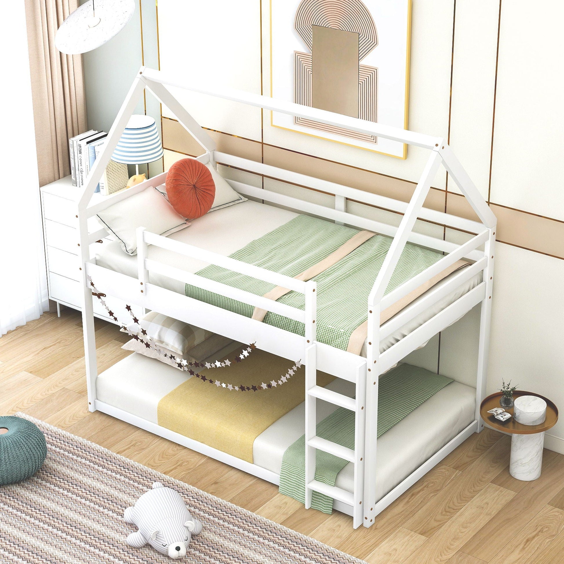 Low bunk bed with house-shaped white frame and ladder, green checkered bedding on Tampa Home & Garden Store