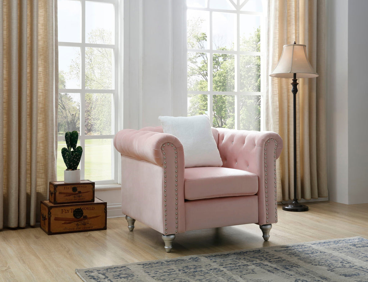 Contemporary pink tufted armchair with nailhead trim and curved arms on Tampa Home & Garden Store